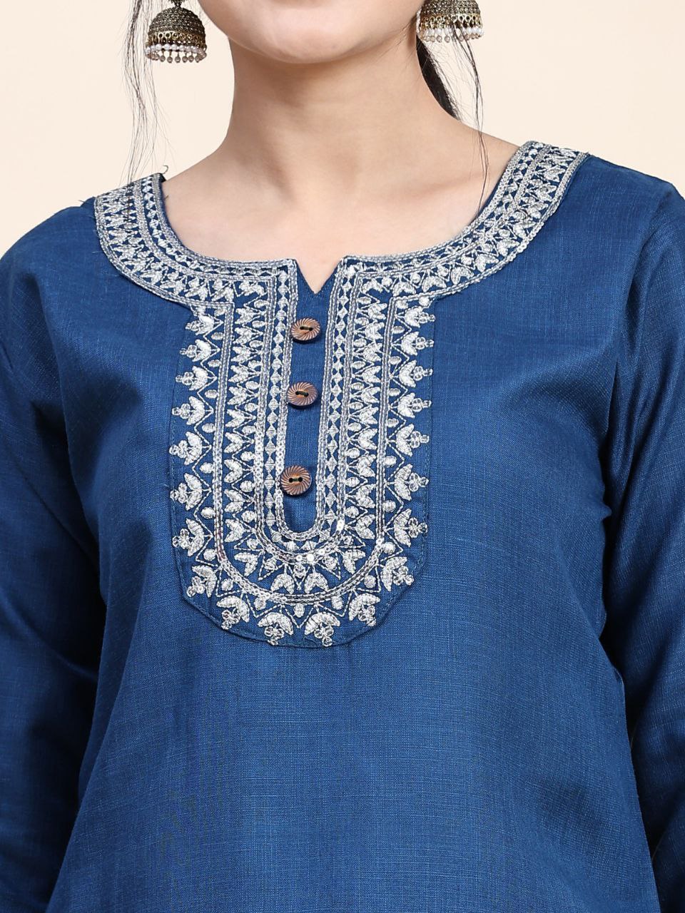 This elegant Designer Kurta Suit Set in a beautiful Rama color